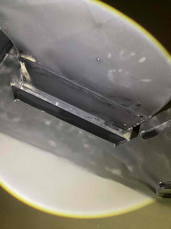 Responded to water leak complaint at diffuser. Upon inspection, found evidence of significant condensation and moisture accumulation on blower assembly and surrounding components. Documented conditions with photos showing water droplets on blower housing and moisture staining on ductwork. System appears to have drainage or insulation issue causing condensate to reach diffuser instead of draining properly through designated drain lines.