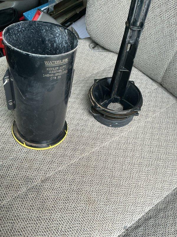 Responded to service call for plumbing issues including constantly running toilet and shower stopper inspection, as well as refrigerator door concerns. Inspected toilet tank components and identified faulty fill valve requiring replacement; installed new Kohler fill valve assembly with waterline connection to resolve continuous running issue. Examined shower drain stopper mechanism and verified proper operation. Assessed refrigerator door alignment and seals, confirming functionality within normal parameters.