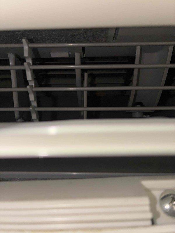 Responded to service call for 15-year-old mini split system experiencing immediate shutdown after startup. Upon arrival, performed diagnostic inspection of both indoor and outdoor units. Examined interior evaporator components, air distribution grid, and housing for obstructions or mechanical failures. Inspected outdoor condensing unit mounted on concrete pad, checking electrical conduit connections, refrigerant lines, and overall system integrity. Documented equipment condition through photographic evidence showing normal component wear consistent with system age. Unit operational status assessed and customer contacted en route as requested.