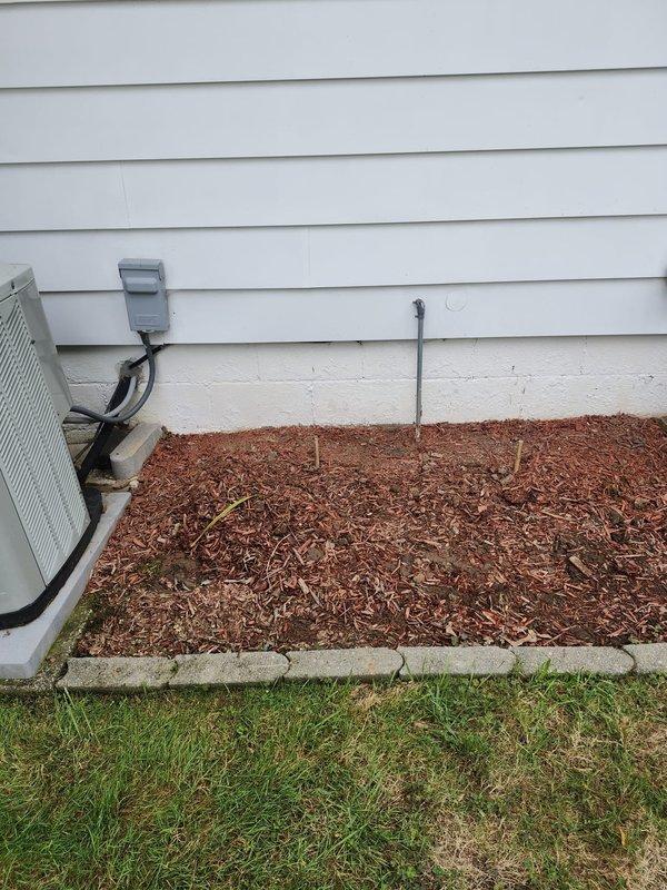 # HVAC Install - Complete System

Completed full furnace and air conditioning system retrofit at residential property. Installed new Lennox outdoor condensing unit on level pad with proper clearances from structure. Unit positioned on black equipment pad with stone base for drainage and stability. Ran new electrical conduit and wiring from unit to exterior disconnect switch mounted on house siding. Verified proper electrical connections and secure mounting of all exterior components.

Interior furnace installation completed with new equipment tied into existing ductwork system. All refrigerant lines properly insulated and secured. System startup performed with verification of proper airflow, refrigerant charge, and electrical operation. Unit tested through complete heating and cooling cycles to confirm proper operation. All safety controls and disconnect switches verified functional. Installation meets manufacturer specifications and local code requirements.