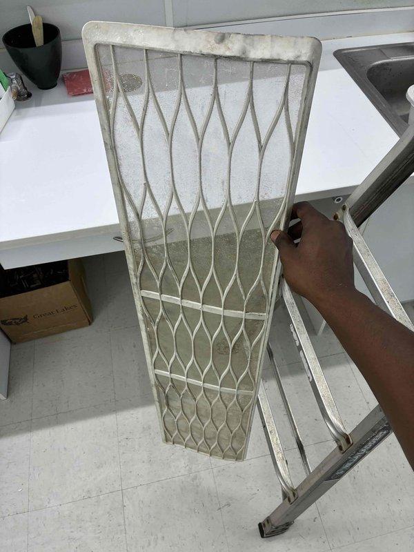 Responded to callback for non-operational mini split system. Upon inspection, discovered severely clogged return air filter with heavy dust and debris accumulation, restricting airflow and preventing proper system operation. Removed and cleaned filter media, restoring adequate airflow to unit, and verified system returned to normal cooling operation.