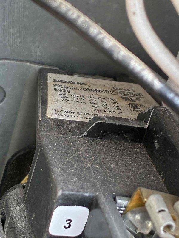 Responded to emergency service call for commercial air conditioning system failure shortly after recent preventive maintenance visit. Upon arrival, conducted thorough diagnostic assessment of rooftop unit. Inspected condenser fan motor assembly and found Siemens motor (Model 45CG10AJDB1H66) operational but noted significant deterioration of outdoor unit components. Observed extensive rust and corrosion on condenser fan guard, fan blades, and central hub assembly, indicating prolonged weather exposure and potential compromised structural integrity. Evaluated electrical connections and wiring conditions at motor housing. Documented equipment condition with photographs for records and future reference. Advanced age and severe corrosion of outdoor components may be contributing factors to system reliability issues despite recent maintenance service. Recommended comprehensive evaluation of condenser unit replacement due to extensive corrosion affecting critical components.