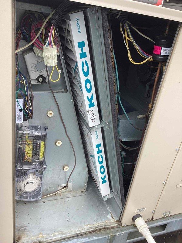 Completed scheduled commercial cooling maintenance visit on rooftop HVAC unit. Performed system inspection with access panels opened to verify electrical connections, control board operation, and wiring integrity. All wire bundles, connectors, and junction boxes inspected and found secure with no signs of overheating or damage. Measured ambient temperature at 82.9°F using calibrated digital thermometer to verify proper system operation under current load conditions. Unit operating within normal parameters with no deficiencies noted.