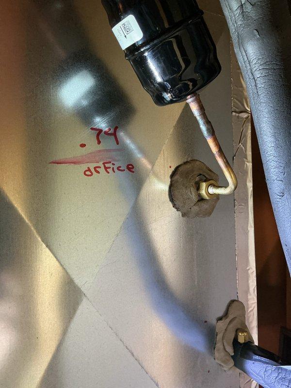 Responded to warranty service call for evaporator coil replacement due to refrigerant leak that was identified during previous service visit. Removed failed coil and obtained measurements for replacement unit. Brazed new copper refrigerant lines and applied insulation to connections. Completed leak repair under manufacturer warranty coverage.