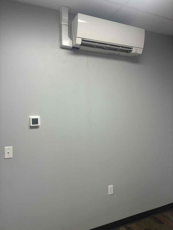 Responded to water leak complaint on breakroom mini-split system. Upon inspection, found clogged drain line causing condensate overflow from the indoor air handler unit. Removed and cleaned drain pump filter assembly, which showed significant sediment buildup and debris accumulation restricting proper drainage. Flushed drain line, reassembled components, and verified system operation with no further leakage detected.