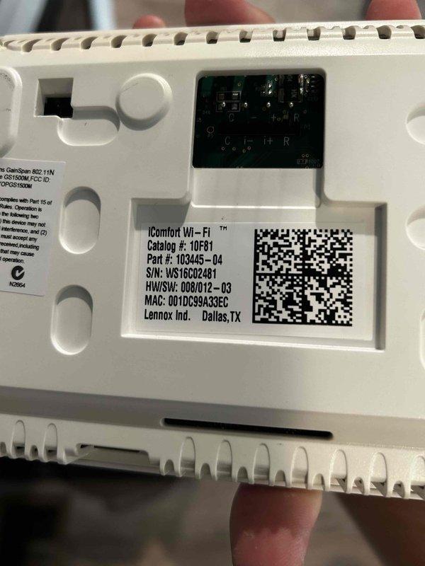 Responded to emergency service call for non-functioning thermostat with blank display while air conditioning unit continued to operate. Diagnosed Lennox iComfort Wi-Fi thermostat (Model 1DF81) experiencing complete display failure on seven-year-old system. Removed thermostat from wall plate to inspect unit and verify model specifications including serial number and hardware/software version. Provided homeowner with manufacturer documentation and operating manual for future reference. System evaluation completed and homeowner advised of findings.