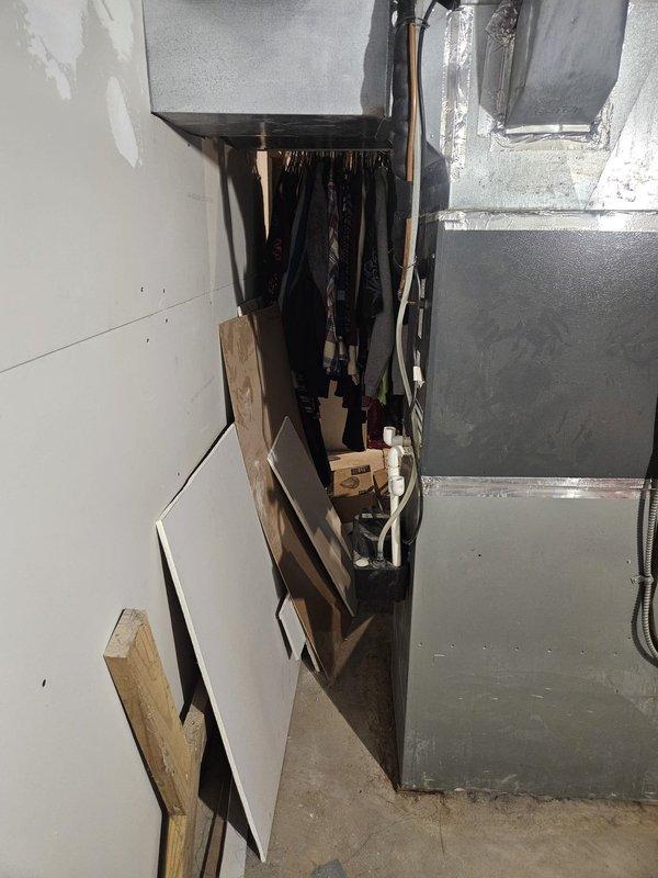 Responded to service call for HVAC system experiencing short cycling during heating season and continuous runtime with freeze-up during cooling season. Performed comprehensive system diagnostics including ductwork inspection using micro camera equipment to assess airflow restrictions and internal conditions. Evaluated refrigerant line configuration, ductwork connections, and overall system installation in basement mechanical space. Identified potential airflow issues and system operation concerns affecting both heating and cooling performance.