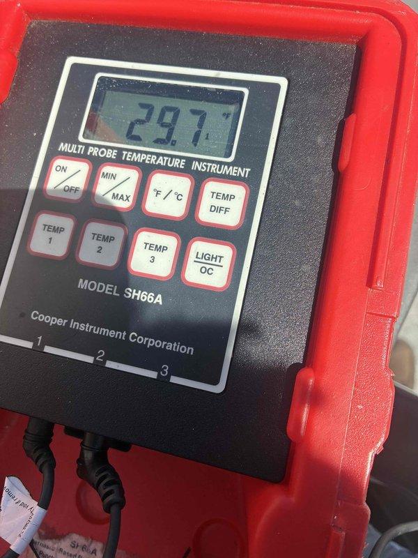Performed spring maintenance inspection on commercial HVAC unit experiencing operational issues. Upon inspection, discovered severe ice buildup throughout the evaporator coil and interior components, indicating restricted airflow or refrigerant system malfunction. Documented system temperatures using multi-probe digital thermometer, recording readings to assess cooling performance and diagnose root cause of icing condition. Recommended further evaluation of airflow restrictions, refrigerant charge levels, and potential metering device issues to restore proper system operation.