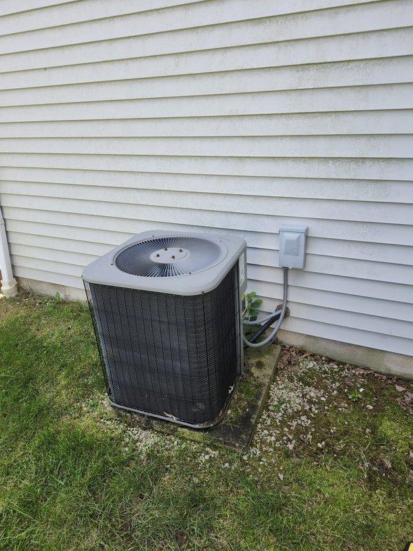 Completed retrofit installation of complete air conditioning system including outdoor condenser unit and indoor evaporator coil. Removed existing equipment and installed new Lennox system with proper refrigerant line sets, condensate drainage, and electrical connections. Outdoor condenser unit positioned on level pad adjacent to structure with line set routed through exterior wall via protected conduit. Indoor air handler installed in mechanical room with copper refrigerant lines, insulated suction line, PVC condensate drain piping, and all necessary shut-off valves. System tested for proper operation, refrigerant charge verified, and all connections inspected for leaks. Installation meets manufacturer specifications and local code requirements.