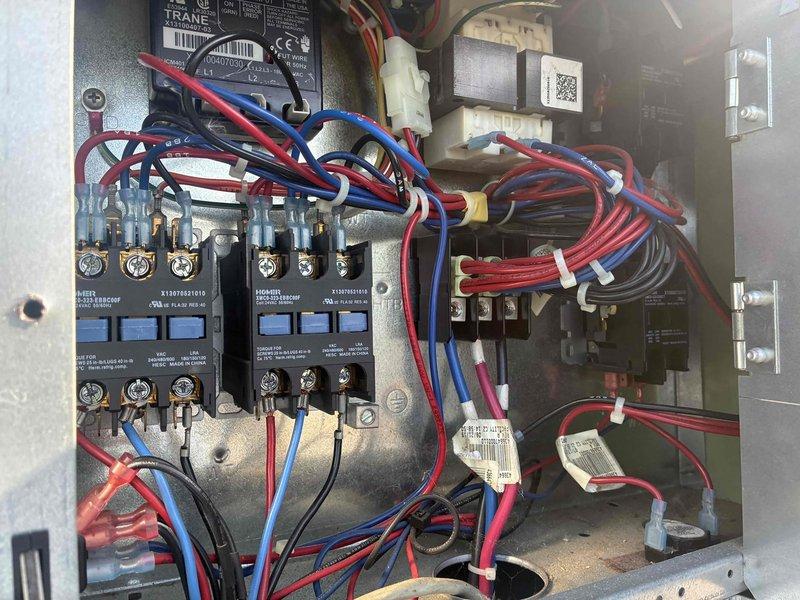 Completed scheduled commercial cooling maintenance visit and comprehensive system inspection. Performed thorough examination of electrical control panel components including contactors, relays, transformer, and control boards, verifying all connections, wiring integrity, and proper operation of HVAC control systems. All electrical components, circuit boards, terminal blocks, and safety devices were inspected and found to be in normal operating condition with no deficiencies noted.
