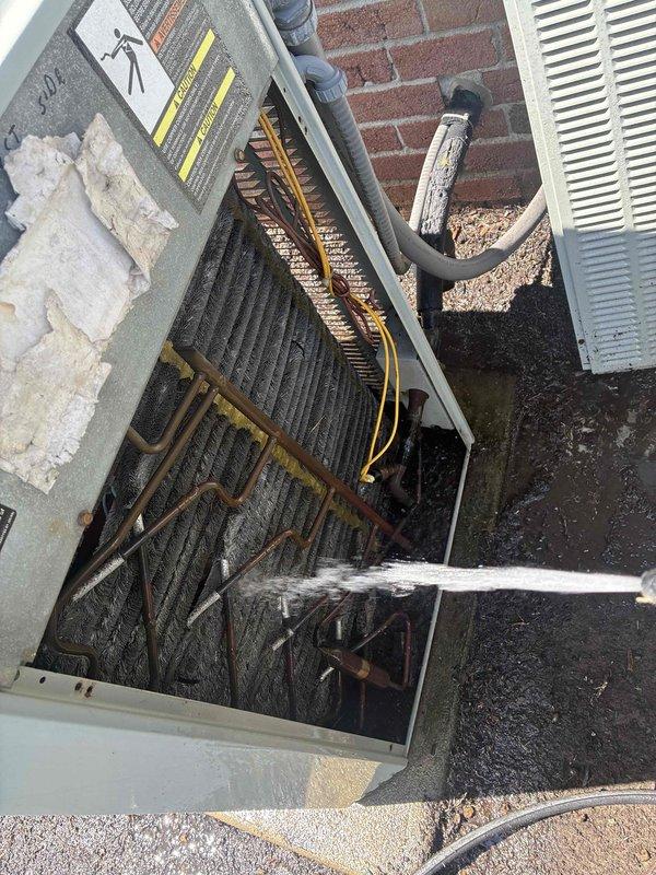 Completed routine commercial cooling maintenance on multiple outdoor HVAC units. Performed thorough inspection and cleaning of heavily soiled condenser unit with significant dirt, dust, and debris accumulation on exterior surfaces and internal finned coil assembly. Removed caked-on grime from metal casing and corrugated panels. Inspected evaporator coils which displayed substantial clogging from dust, lint, and particulate matter buildup. Examined copper refrigerant lines for corrosion and proper connections. Verified electrical wiring connections and component functionality. Documented pre-service condition showing extreme dirt accumulation requiring deep cleaning to restore proper airflow and system efficiency.