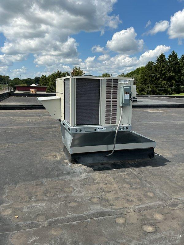 Completed preventive maintenance service on multiple commercial rooftop HVAC units installed on flat membrane roof. Performed comprehensive PM inspection procedures on all rooftop units, including operational checks, component inspection, and system evaluation. All equipment found to be in operational condition with units mounted on proper curb adapters and structural supports. Documentation completed with photographic records of installed equipment and rooftop conditions for service history.