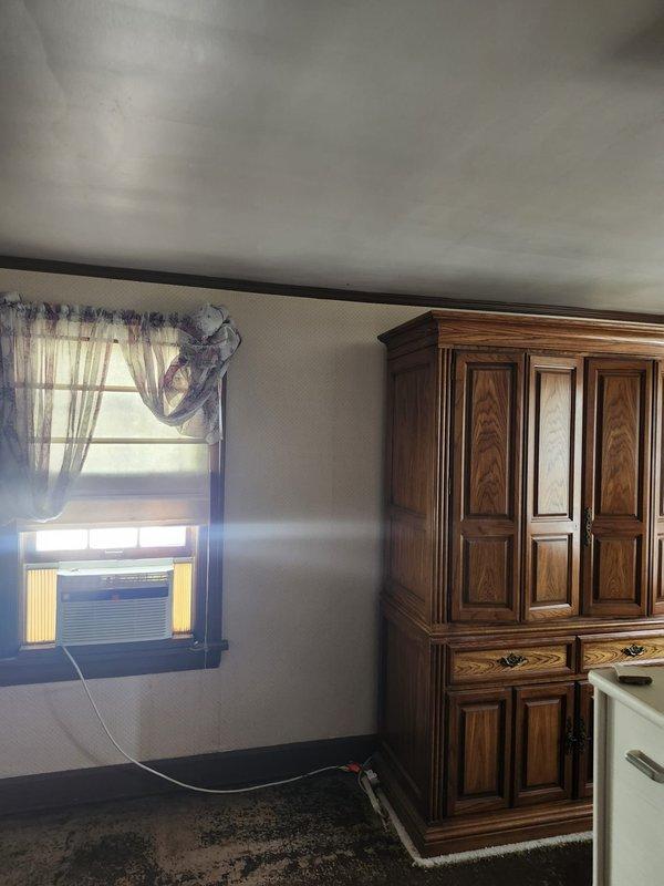 Completed installation of a 3-head ductless mini-split system to replace existing window air conditioning units. System includes indoor air handlers strategically positioned throughout the residence and outdoor condensing unit with refrigerant line sets and electrical connections properly installed per manufacturer specifications.