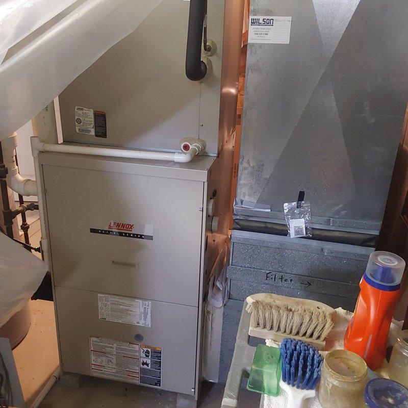 Completed AC retrofit installation in basement utility area. Installed new Lennox Elite Series furnace with proper refrigerant line connections and integrated condensate drainage system. Configured air handler with filter access and ensured all manufacturer specifications were met for optimal system performance.
