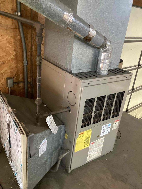 Completed scheduled commercial filter change on HVAC furnace unit located in basement utility area. Replaced air filters per maintenance protocol and verified system operation. Equipment and surrounding work area left clean and secure upon completion.