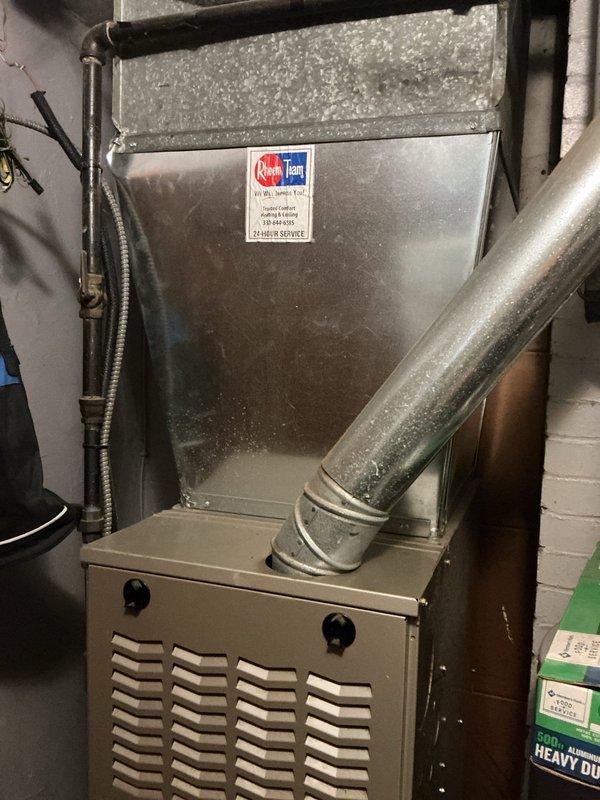 Completed HVAC estimate for air conditioning retrofit on rental property. Documented existing Bryant furnace installation in basement mechanical room, including current ductwork configuration, plenum connections, and refrigerant line routing. Assessed equipment accessibility, electrical service connections, and available space for proposed AC system integration with existing forced-air heating system.