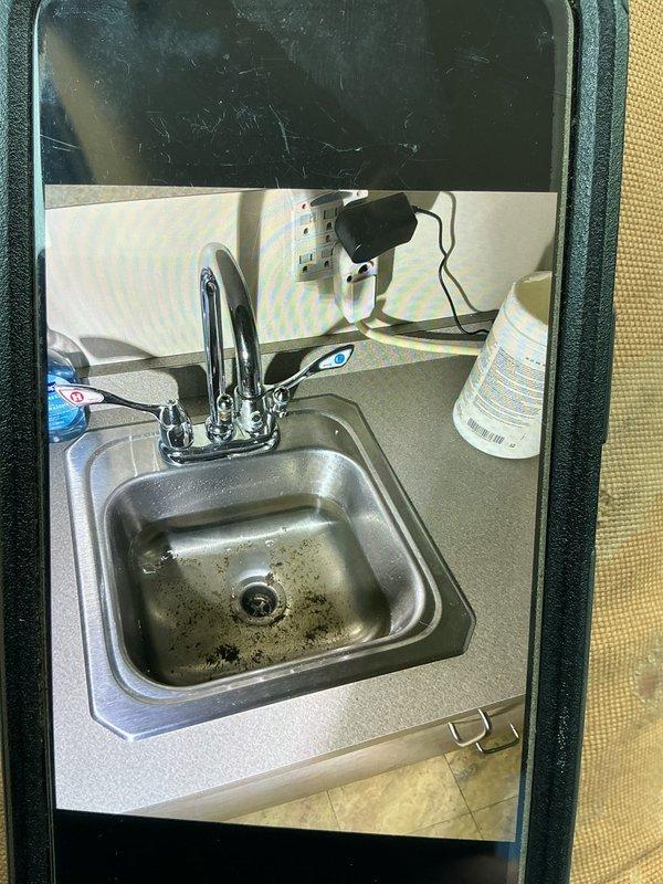 Responded to service call for clogged drains affecting three sink locations throughout the property. Upon arrival, performed diagnostic assessment of all affected fixtures, including stainless steel sink basins in compact living spaces. Utilized mechanical snaking equipment and appropriate drain cleaning methods to clear obstructions from drain lines. Removed debris and buildup causing blockages in each affected drain system. Tested water flow and drainage at all three sink locations to verify proper function and confirmed complete restoration of drainage capability. All fixtures left in working order with proper flow rates established.