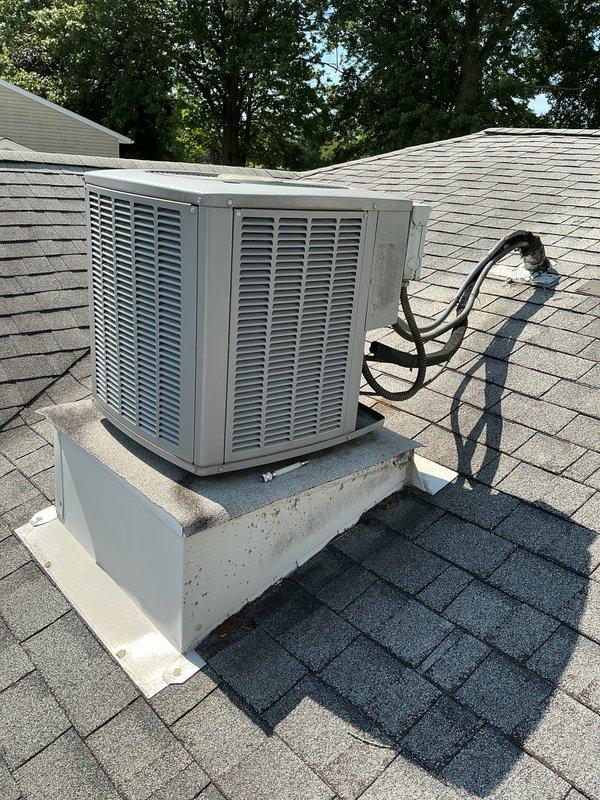 Completed full HVAC system retrofit including replacement of rooftop condenser unit and indoor furnace assembly. Installed new Armstrong Air Ultra furnace in basement utility area with properly configured supply and return ductwork. Mounted replacement condenser unit on rooftop location with secure concrete pad mounting, connected refrigerant lines and electrical conduit. Verified all ductwork connections sealed with metal tape, PVC condensate drainage properly routed, and system integration with existing plumbing infrastructure. System tested and confirmed operational.