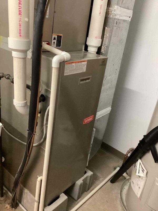 Completed scheduled commercial heating maintenance on Bryant HVAC system and KCCB air handler unit. Performed visual inspection of equipment, verified proper operation of furnace and air handling components, checked PVC venting and condensate drainage lines, and inspected all electrical connections and controls. All equipment found to be in normal operational condition with no deficiencies noted.