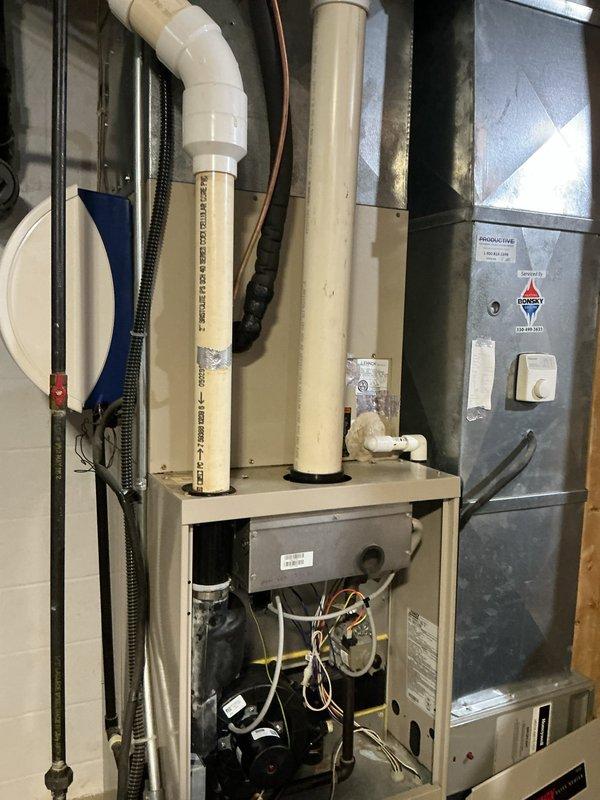 Completed full HVAC system replacement including new furnace and air handler installation in residential basement utility room. Integrated air cleaner into the new system, connected all necessary ductwork, ventilation piping, electrical wiring, and condensate drainage. All components tested and verified operational upon completion.