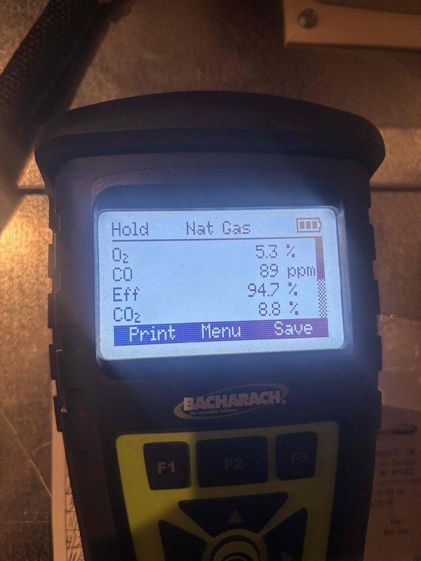 Completed MVP maintenance on a 2-year-old furnace located in the basement. Performed comprehensive system inspection and combustion analysis using Bacharach analyzer, which confirmed optimal performance with oxygen levels at 5.3%, carbon monoxide at 89 ppm, efficiency at 94.7%, and carbon dioxide at 8.8%. All readings within acceptable parameters for safe and efficient natural gas furnace operation.