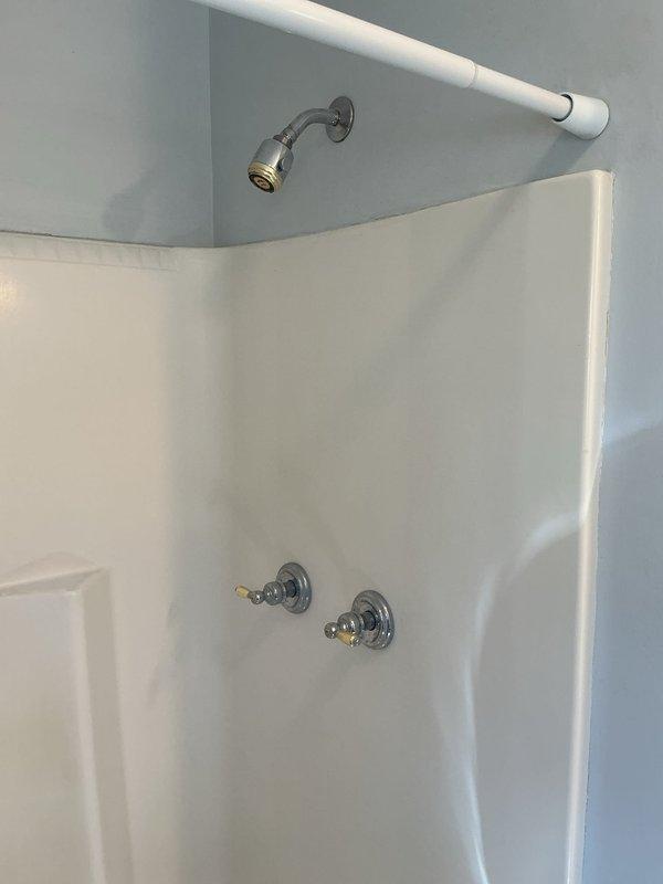 Responded to service call for dripping faucets in bathroom sink and shower. Repaired leaking two-handle centerset faucet at bathroom sink and addressed dripping shower valve. Installed new shower head per customer request to replace existing fixture. All faucets tested and confirmed operating properly without leaks upon completion.