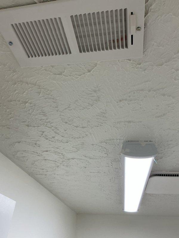 Completed installation of fire damper and door assembly in new commercial construction space. Installed ceiling-mounted air vent with horizontal slat design and performed preventive maintenance inspection of equipment. All components installed per code requirements and manufacturer specifications, with system verified operational upon completion.