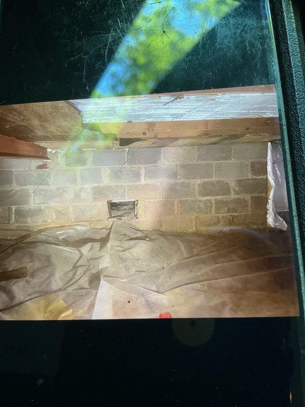 Completed gas line installation for fireplace connection. Routed new gas piping through crawl space beneath structure, securing line to floor joists with appropriate hangers and supports. Installation included connection to existing gas supply system and proper termination point for fireplace hookup, with all work performed in accordance with applicable gas fitting codes and safety standards.
