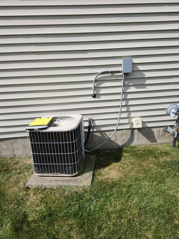 Completed full HVAC system retrofit including installation of new Lennox furnace in basement utility room and outdoor condensing unit. Installed all necessary ductwork connections with galvanized steel components, configured PVC condensate drainage system with proper trap, and ran refrigerant lines with insulation from outdoor unit to indoor coil. Mounted electrical disconnect box on exterior wall, established all electrical connections, and positioned outdoor unit on concrete pad with proper clearances. System tested and operational.