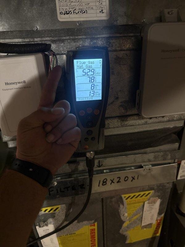 Completed annual heating maintenance and tune-up on residential gas furnace. Performed comprehensive system inspection with access panel removed, checked all electrical connections and wiring, verified proper operation of blower motor assembly, inspected condensate drain pan and drainage system for proper function. Conducted combustion analysis using digital analyzer, measuring flue gas temperatures and natural gas combustion efficiency to ensure optimal performance and safe operation. All components found operating within manufacturer specifications, system cleaned and tested successfully.