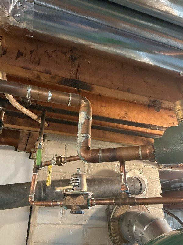 Completed furnace cleaning and inspection service. Verified proper operation of heating system, inspected copper piping connections and expansion tank assembly, and confirmed all mechanical components are functioning within normal parameters.