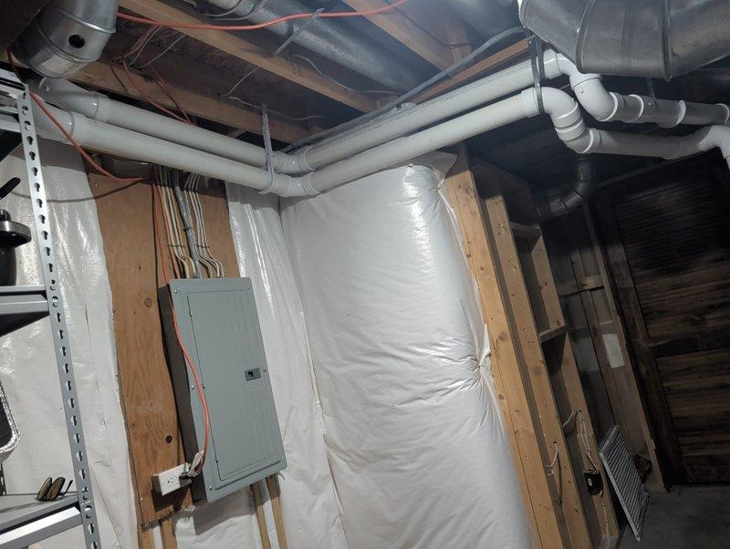 Completed furnace retrofit, upgrading existing 80% efficiency unit to new 97% high-efficiency model in residential utility closet. Installed new condensate drainage system with white PVC piping, including proper pitch and trap configuration for high-efficiency operation. Routed intake and exhaust venting through PVC pipe system, ensuring proper termination and code compliance. Modified and reconnected supply and return ductwork to accommodate new equipment footprint, utilizing flexible duct connections where necessary. Mounted unit in confined space, verified proper clearances, and completed all electrical connections with appropriate disconnect. System tested and operational, achieving proper combustion efficiency and condensate removal.