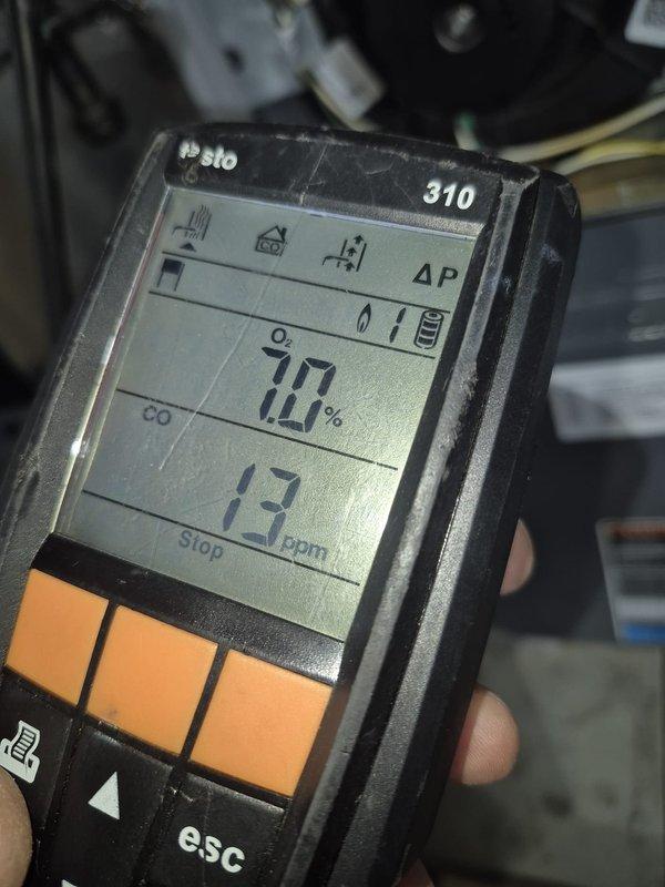Performed seasonal heating maintenance on an 11-year-old basement-installed furnace, including a combustion analysis that measured 7.0% O₂ and 13 ppm CO, within acceptable operating limits. Inspected the induced draft motor assembly and identified it as a recommended replacement item, and sourced the replacement part for the customer's review.