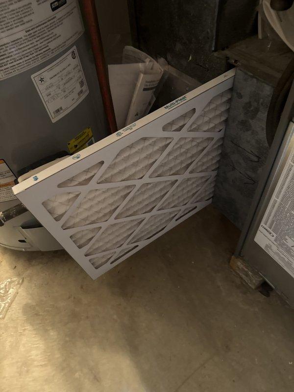 Performed fall heating maintenance on the natural gas furnace, including a flue gas combustion analysis showing 6.9% O2, 43.8% excess air, and 11 ppm CO (16 ppm air-free), all within acceptable operating limits. Inspected and serviced the return air filter, which showed moderate dust loading, to maintain proper airflow and system efficiency. Unit operation verified with no visible rust, frost, or damage observed.