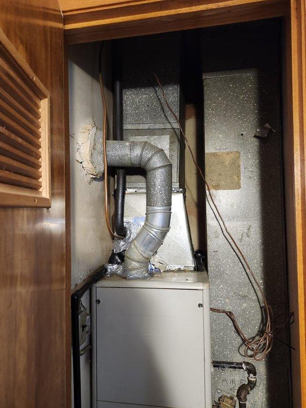 Retrofitted the existing gas furnace with a new AC system, installing the evaporator coil on the supply plenum and connecting it to the condensing unit with refrigerant lines. Sealed and secured the supply duct transitions and plenum connections, and verified gas line connections, venting, and condensate drainage. Commissioned the complete system, confirming proper airflow, refrigerant charge, and heating and cooling operation.