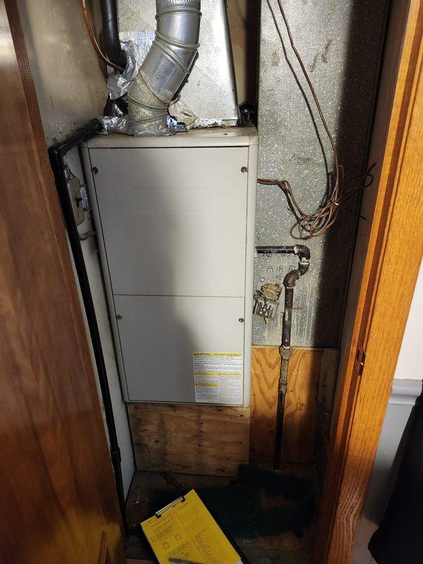 Retrofitted the existing gas furnace with a new AC system, installing the evaporator coil on the supply plenum and connecting it to the condensing unit with refrigerant lines. Sealed and secured the supply duct transitions and plenum connections, and verified gas line connections, venting, and condensate drainage. Commissioned the complete system, confirming proper airflow, refrigerant charge, and heating and cooling operation.