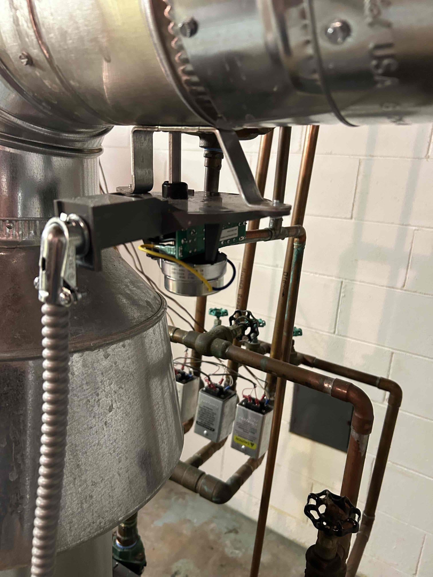 Replaced the automatic flue dumper.
Tested the boiler. System works properly at this time.