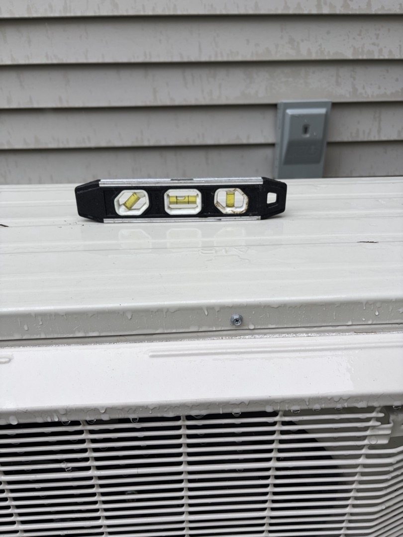 The customer was not home on arrival. I went around to the outdoor unit and leveled the air conditioner. Pictures are attached. All is normal at this time.