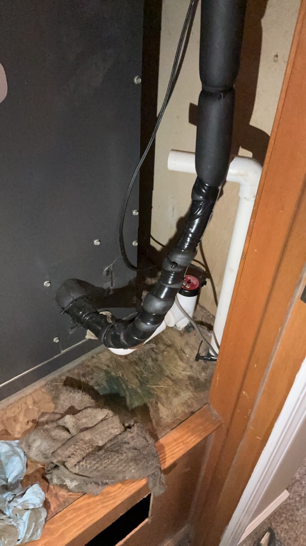 Upon arrival, I was greeted by Joe. He said that they noticed the upstairs thermostat was blank and there was a red light on in the furnace closet.
He showed me to the equipment.
I found the wet switch was activated under the air handler. I dried out the switch. I quoted on blowing out the drain line. Customer approved. I blew out the drain line and flushed with water and added some treatment tablets to the drain pan.

DRAIN LINE SHOULD BE REPLACED but it runs under the second floor, over to the outside wall and down into the basement by the sump pit. Recommend having our plumbing department check to see what would be the best solution for replacing the drain line.

I turned the system on and checked refrigerant levels. The system is low on refrigerant. This can cause the indoor coil to ice up and cause leaking.

I spoke with Joe about his options and about the age of the system. If the system is low on refrigerant, that means there’s a leak somewhere and the cost to repair a 13 year o
