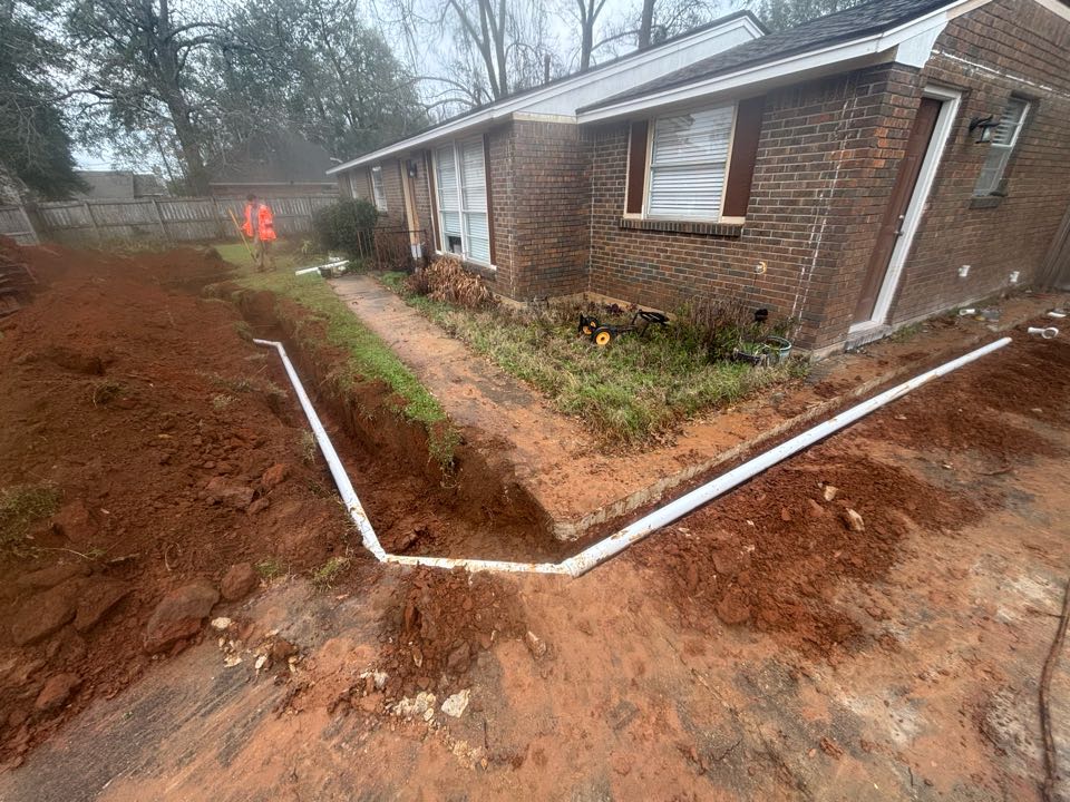 Even with the rain we were able to get another washer reroute completed 