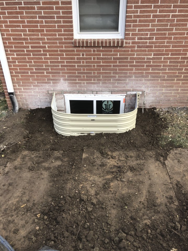 Installing new egress window and window well