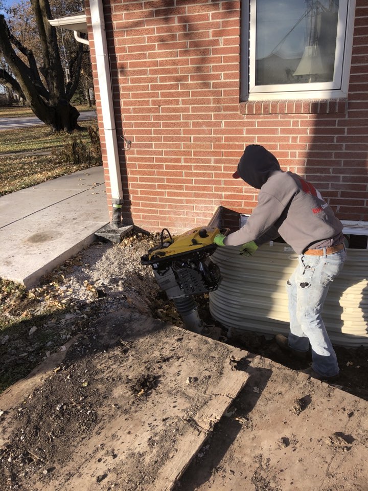 Backfilling/tamping in new egress window wells