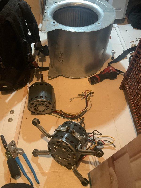 Returned to property to replace failing blower motor in air handler unit as previously diagnosed. Removed and disassembled existing blower assembly, installed new motor, and verified proper operation. Confirmed system voltage reading of 220.5V during testing to ensure electrical specifications were within proper range for new equipment.