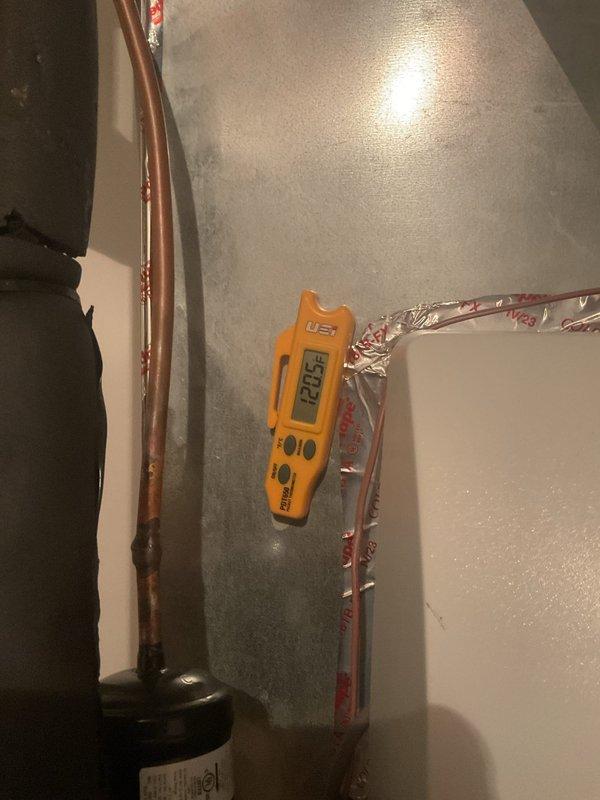 Returned to property to replace failing blower motor in air handler unit as previously diagnosed. Removed and disassembled existing blower assembly, installed new motor, and verified proper operation. Confirmed system voltage reading of 220.5V during testing to ensure electrical specifications were within proper range for new equipment.