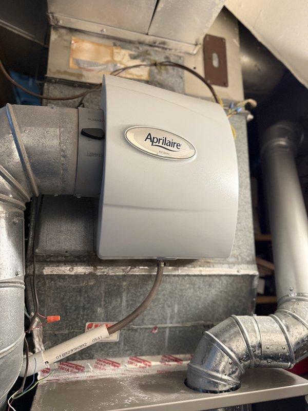Responded to thermostat error code E3. Inspected Aprilaire unit connected to HVAC system and found significant mineral buildup and corrosion in the associated PVC piping. Cleaned sediment accumulation from interior passages to restore proper system function.