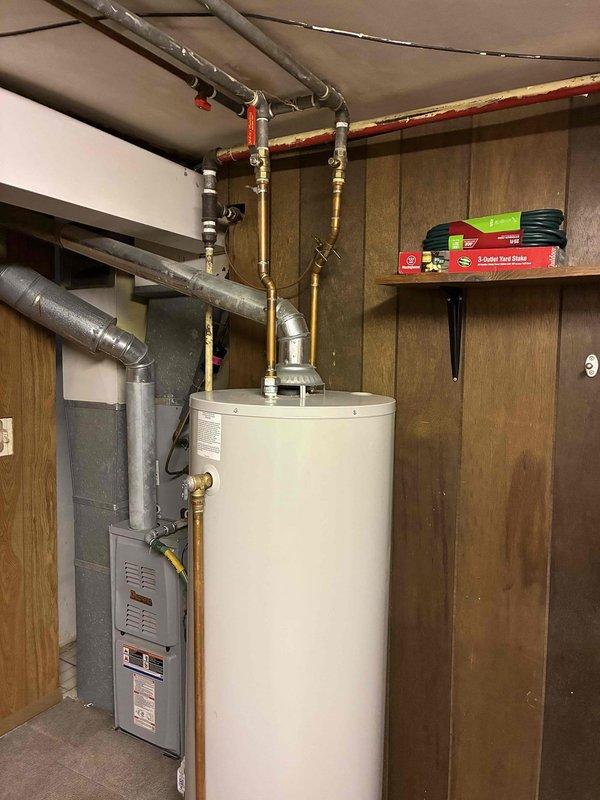 Responded to no hot water complaint for residence. Inspected Honeywell water heater, found issue with control panel. Adjusted temperature settings and verified proper operation, restoring hot water functionality. Informed customer that unit may still be under manufacturer warranty.
