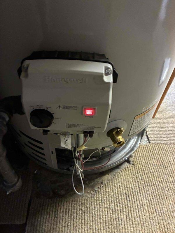 Responded to no hot water complaint for residence. Inspected Honeywell water heater, found issue with control panel. Adjusted temperature settings and verified proper operation, restoring hot water functionality. Informed customer that unit may still be under manufacturer warranty.