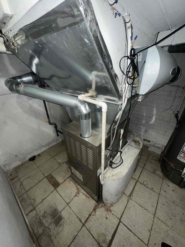 Responded to customer complaint of noise from HVAC unit installed in November. Performed diagnostic inspection of furnace components with focus on the inducer motor and blower assembly. Determined noise was originating from the inducer motor fan blade which had become slightly unbalanced. Adjusted and secured fan blade assembly to eliminate vibration noise. Unit now operating normally with no unusual sounds.
