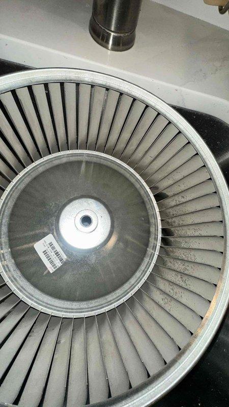 Performed blower wheel cleaning service for Ernesto. Removed blower wheel assembly, thoroughly cleaned accumulated debris and residue from fan blades, and reinstalled component. Cleaning completed as contracted on work order.