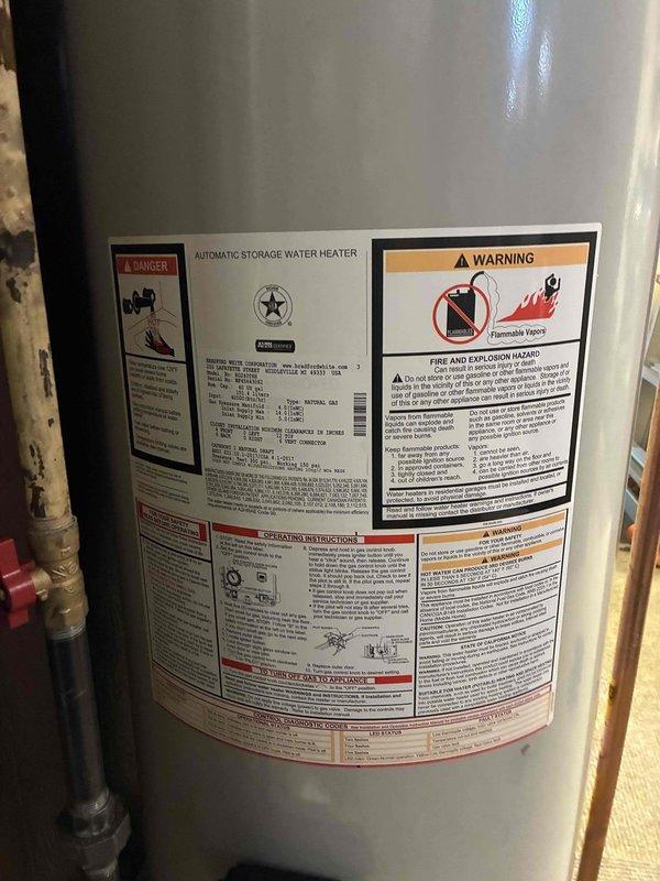 Replaced faulty pilot assembly on customer's water heater. Confirmed proper ignition and flame appearance through sight glass after installation. Unit is now operating correctly with no safety concerns.